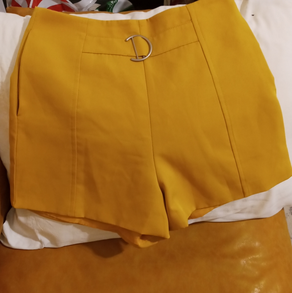 Pair of yellow air and space shorts